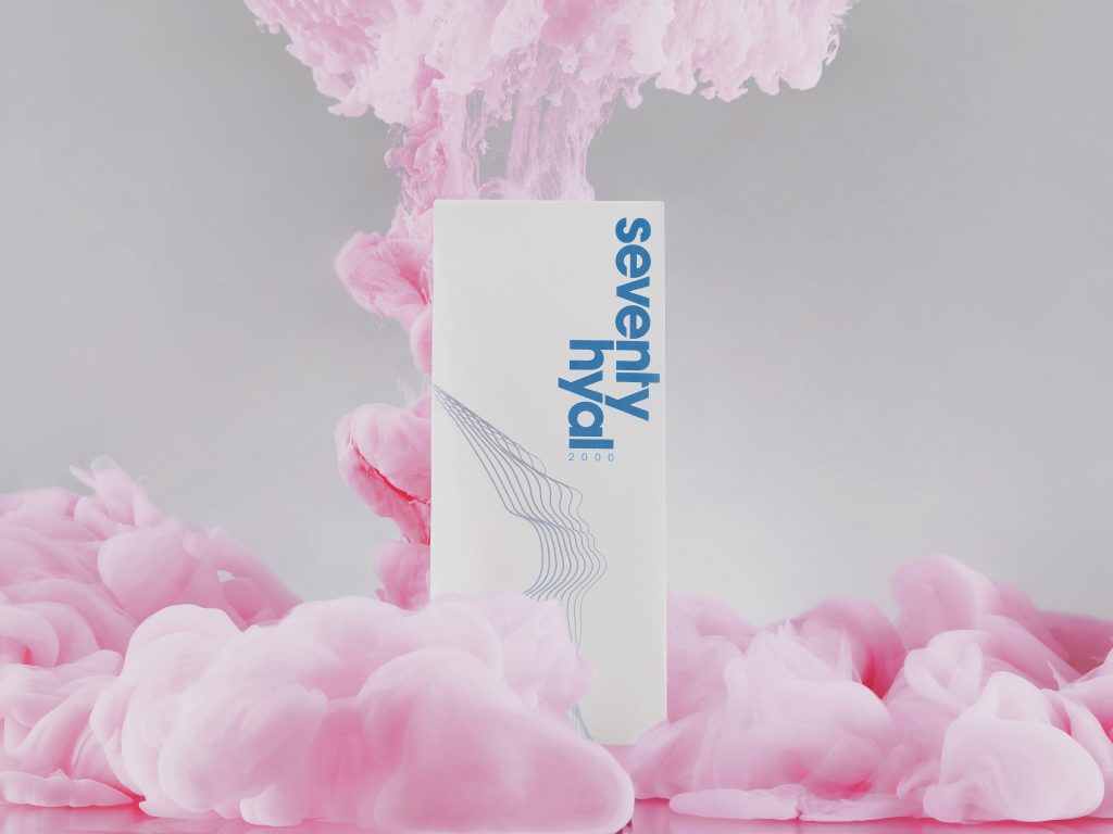 Seventy Hyal box located on a neutral background with an added pink effect to help highlight the brands packaging