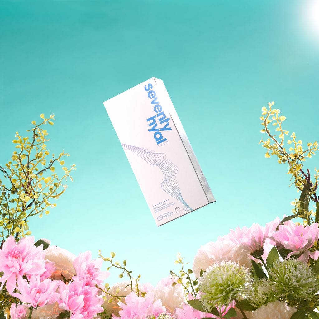 Grow Your Clinic With Seventy Hyal 2000: Seventy Hyal Box with a Spring Background, With Flowers and Sun.